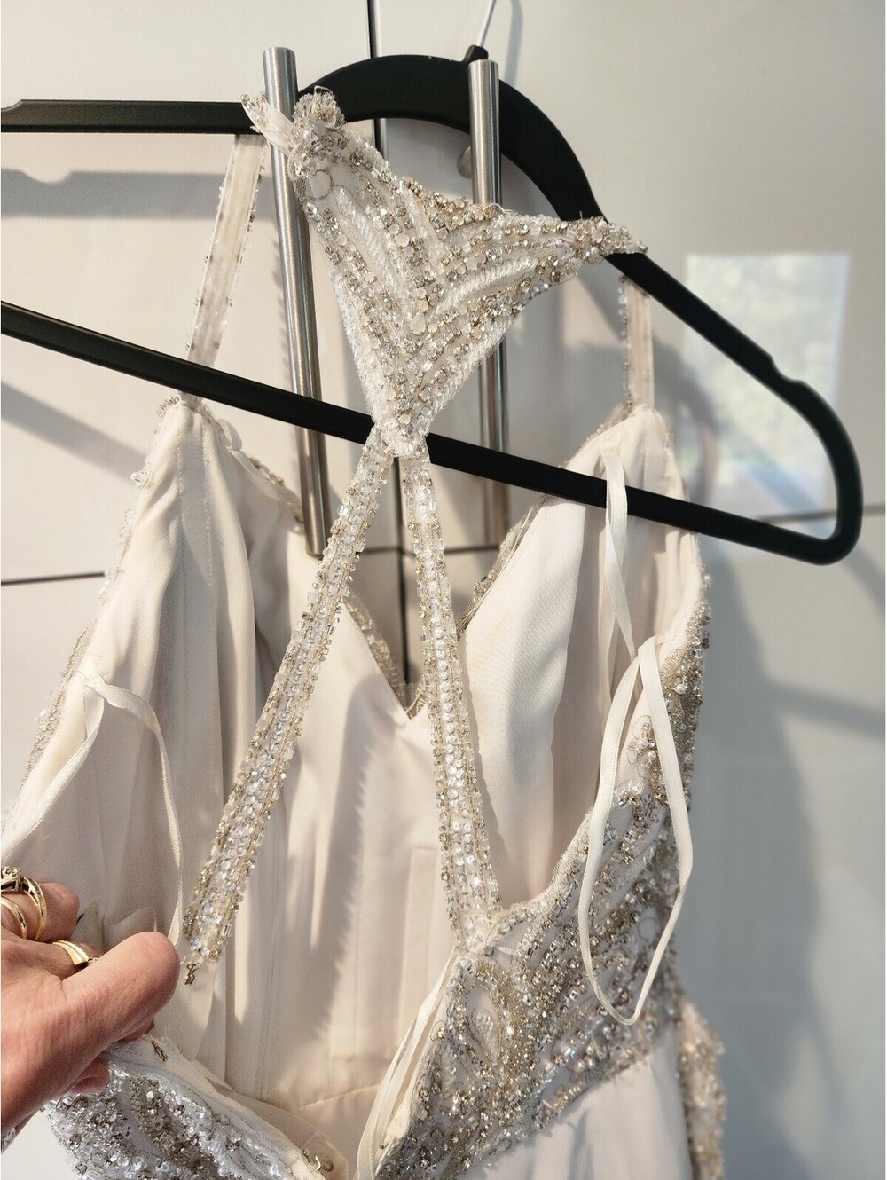 Elegant White Beaded Evening Gown with Sheer Embellished Bodice and Flowing Skit - Picture 3 of 9